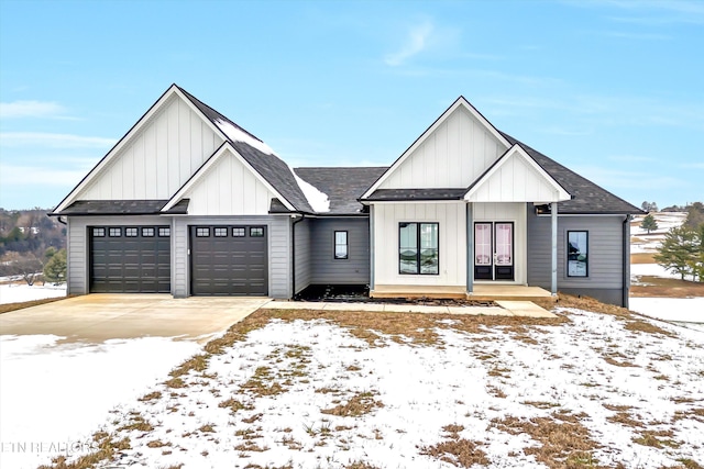 351 Fairway Dr, Dandridge, TN 37725 - modern inspired farmhouse featuring concrete driveway, a shingled roof, board and batten siding, and a garage