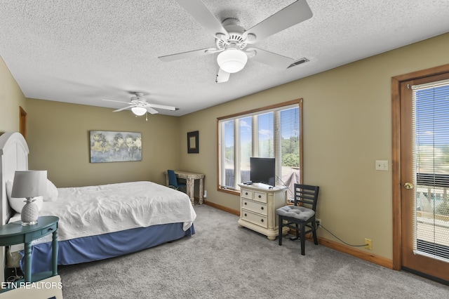 carpeted bedroom featuring a textured ceiling, access to outside, and ceiling fan