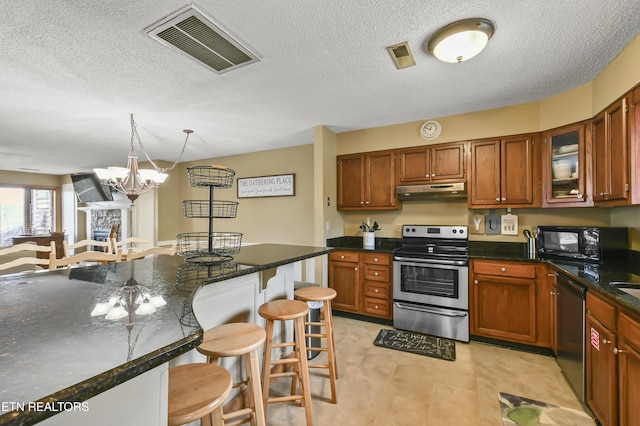 kitchen with a breakfast bar, an inviting chandelier, decorative light fixtures, stainless steel electric range, and dishwasher