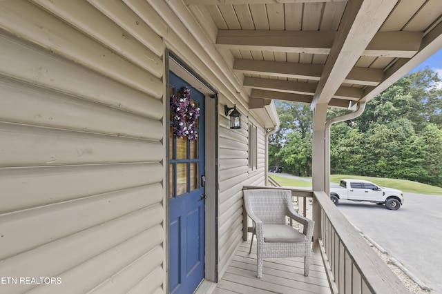 deck with covered porch