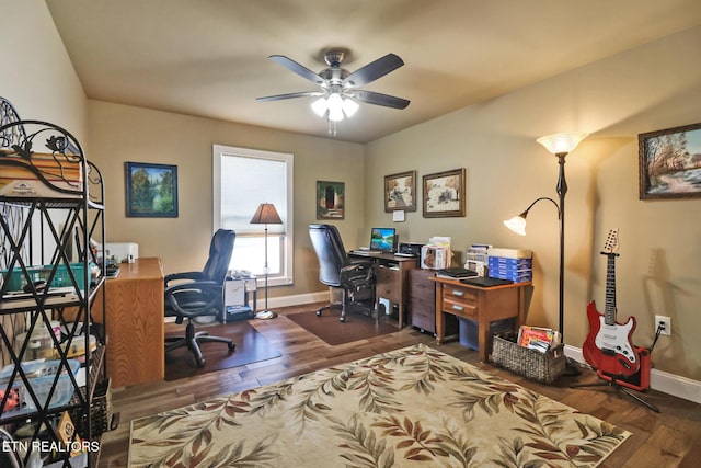 office area featuring ceiling fan and dark wood-type flooring