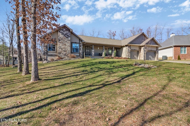 single story home with central AC and a front yard