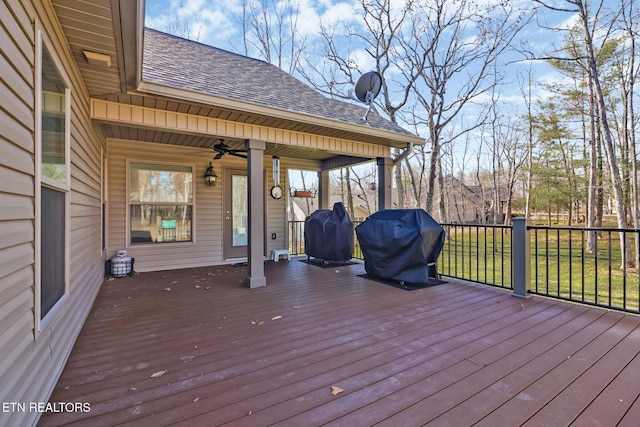 deck featuring grilling area and ceiling fan