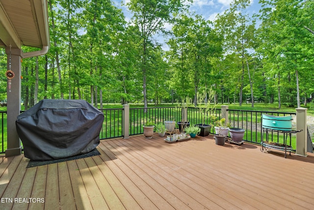 153 Walden Ridge Dr, Fairfield Glade, TN 38558 - wooden deck with area for grilling and view of scattered trees