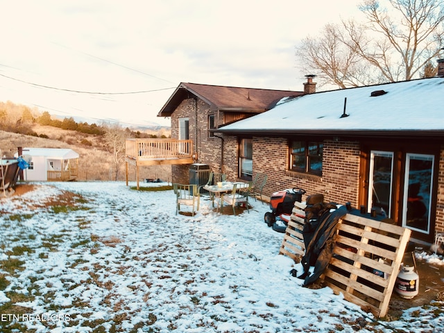 view of yard covered in snow