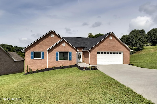 view of front facade with a garage and a front yard