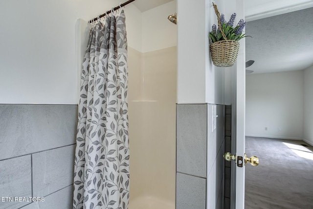 bathroom with a shower with shower curtain