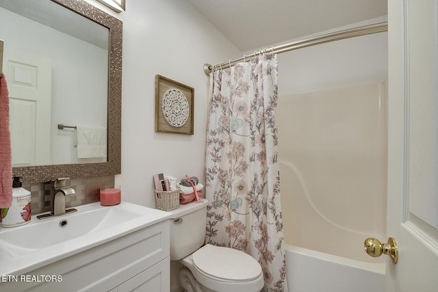 full bathroom with toilet, vanity, shower / bath combination with curtain, and tasteful backsplash