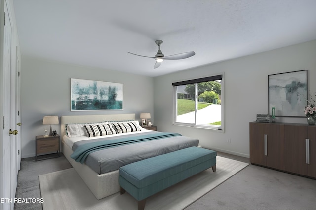 carpeted bedroom with ceiling fan