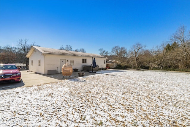 back of property with a patio area