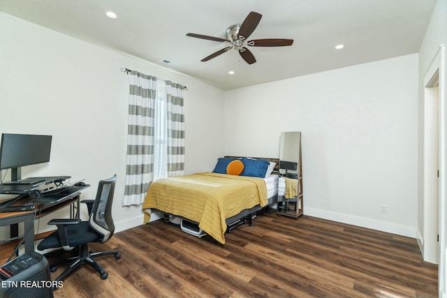 bedroom featuring dark wood-type flooring and ceiling fan