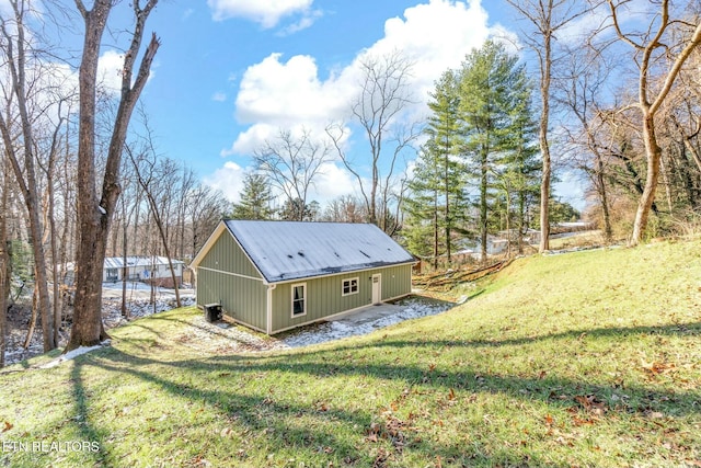 view of property exterior with a lawn