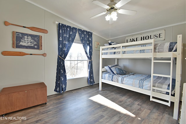 bedroom featuring ceiling fan, dark wood-type flooring, and crown molding