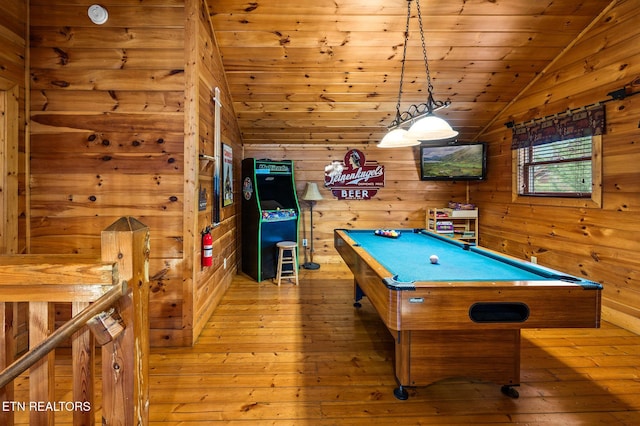 rec room featuring wood ceiling, wood walls, light hardwood / wood-style floors, billiards, and lofted ceiling