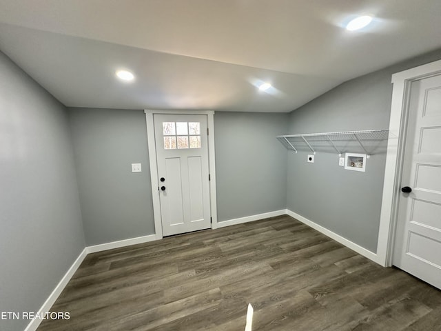 clothes washing area with electric dryer hookup, washer hookup, and dark wood-type flooring