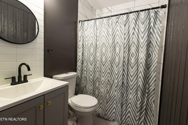 1964 Providence Rd, Sevierville, TN 37876 - bathroom featuring toilet, a shower with shower curtain, decorative backsplash, and vanity