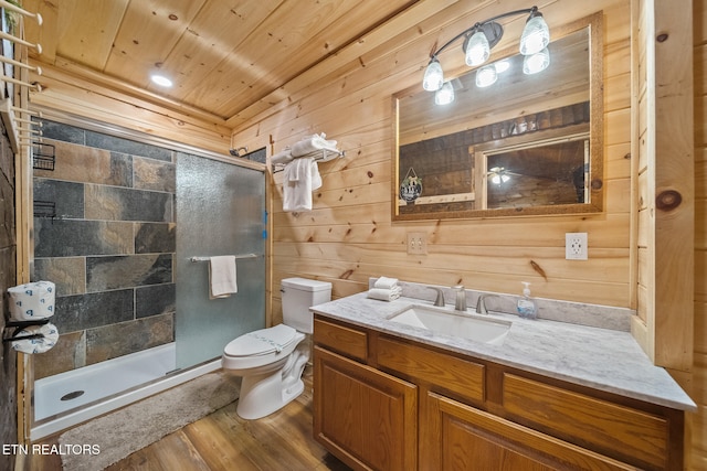 bathroom with a shower with door, wood ceiling, hardwood / wood-style floors, and wooden walls