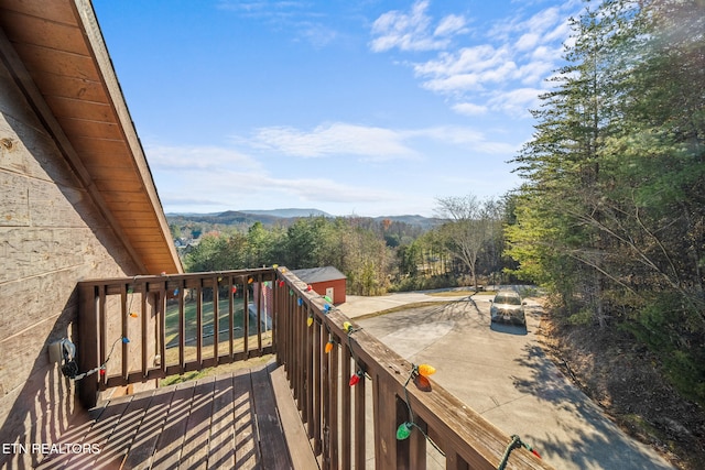 wooden terrace featuring a mountain view