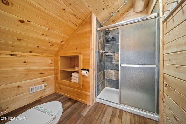 bathroom with walk in shower, wooden walls, vaulted ceiling, and wood ceiling