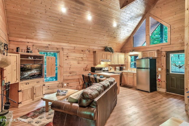 living room featuring wood walls, wood ceiling, light hardwood / wood-style flooring, and high vaulted ceiling