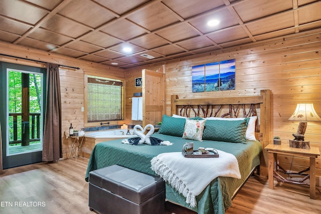 bedroom featuring wooden ceiling, wood walls, coffered ceiling, and hardwood / wood-style flooring