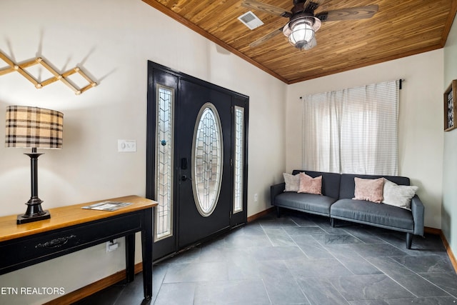 foyer entrance with ceiling fan, crown molding, and wood ceiling