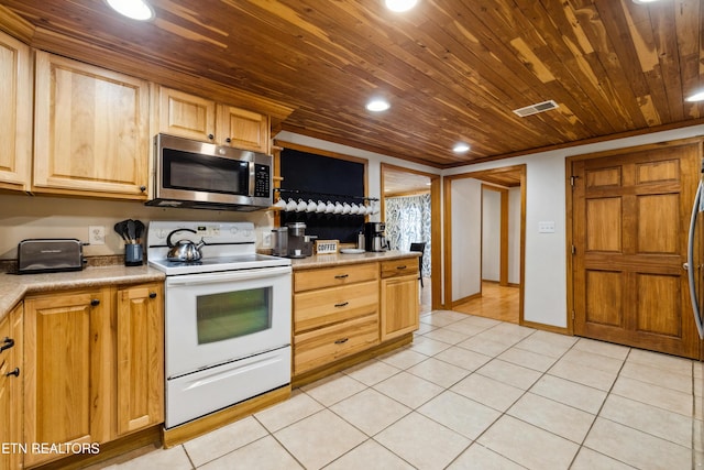 kitchen featuring wooden ceiling, electric stove, and light tile patterned floors