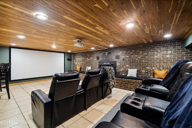 tiled home theater featuring brick wall and wood ceiling