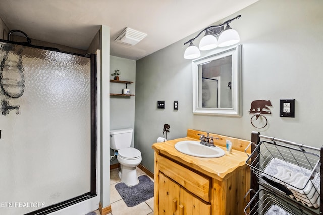 bathroom featuring vanity, an enclosed shower, tile patterned flooring, and toilet