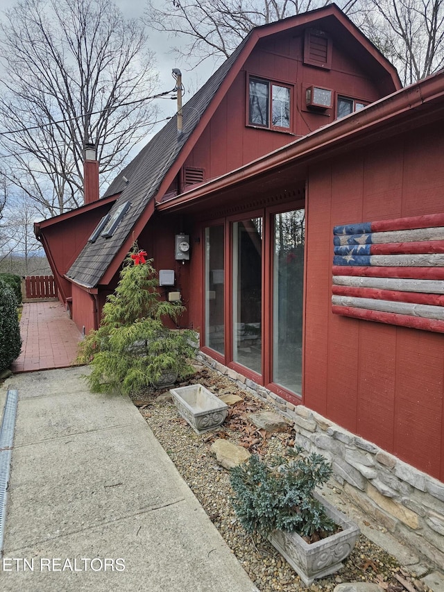 537 Gatlin Dr, Gatlinburg, TN 37738 - exterior space with stone siding and a shingled roof