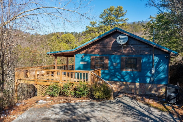 view of front of home with a deck