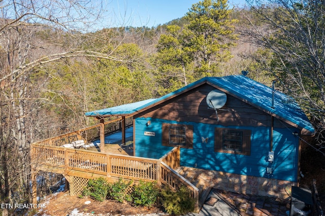 view of front of property with a deck