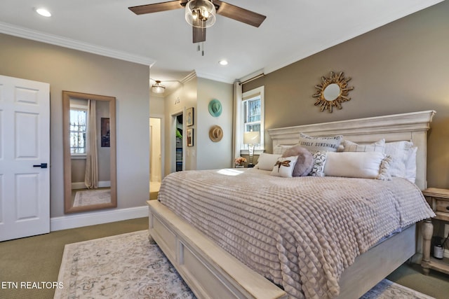 carpeted bedroom with ceiling fan, ornamental molding, and multiple windows