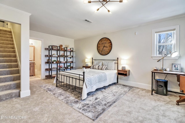 bedroom featuring light colored carpet