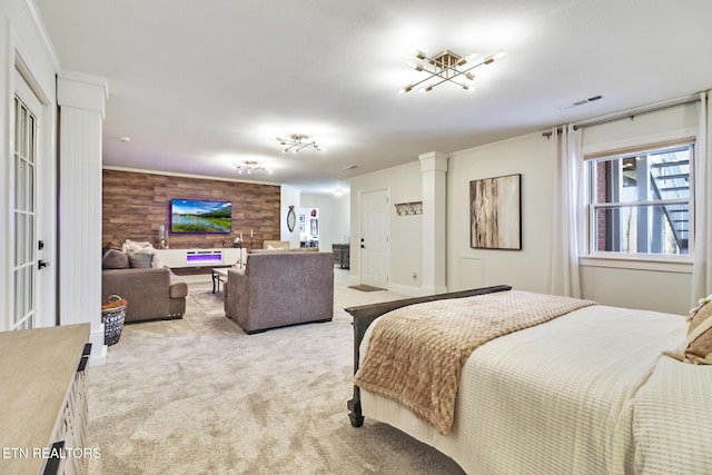 carpeted bedroom with wood walls