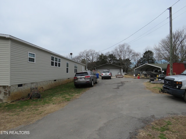 view of street featuring driveway