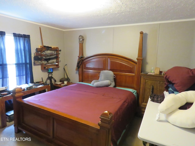 bedroom featuring multiple windows, a textured ceiling, and ornamental molding