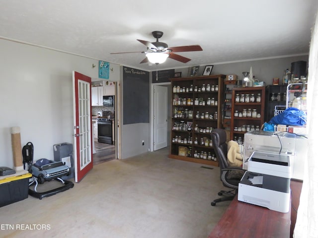 office featuring crown molding, carpet flooring, french doors, and ceiling fan