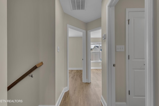 hallway featuring light hardwood / wood-style floors