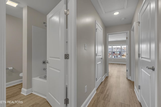 hall featuring light hardwood / wood-style flooring