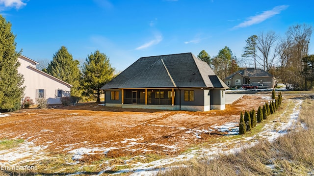 view of snow covered house