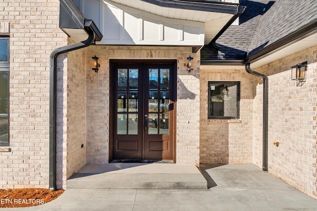 doorway to property with french doors