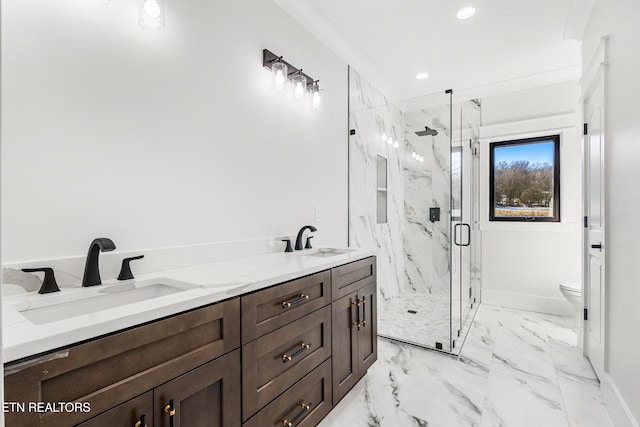 bathroom with toilet, an enclosed shower, vanity, and crown molding