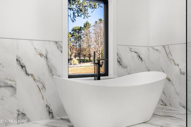 bathroom with a bathing tub