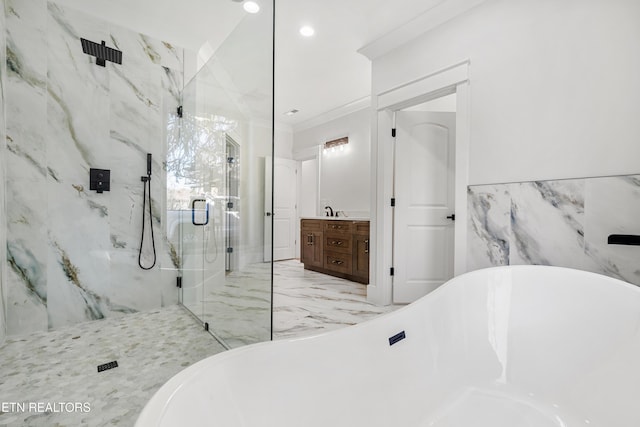 bathroom featuring independent shower and bath, tile walls, crown molding, and vanity