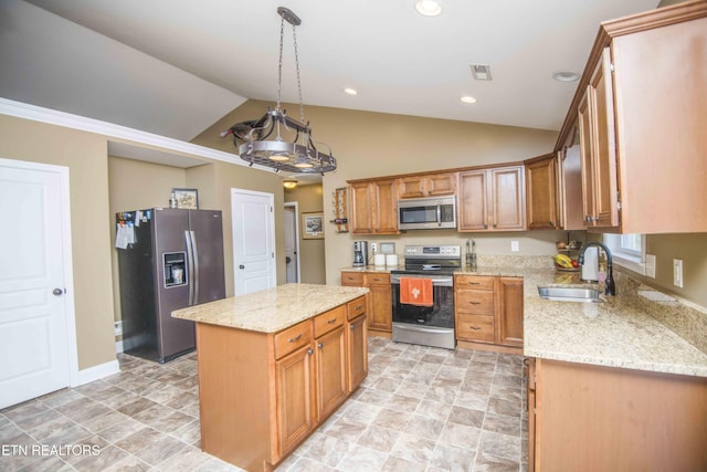 kitchen featuring stainless steel appliances, sink, a center island, lofted ceiling, and hanging light fixtures