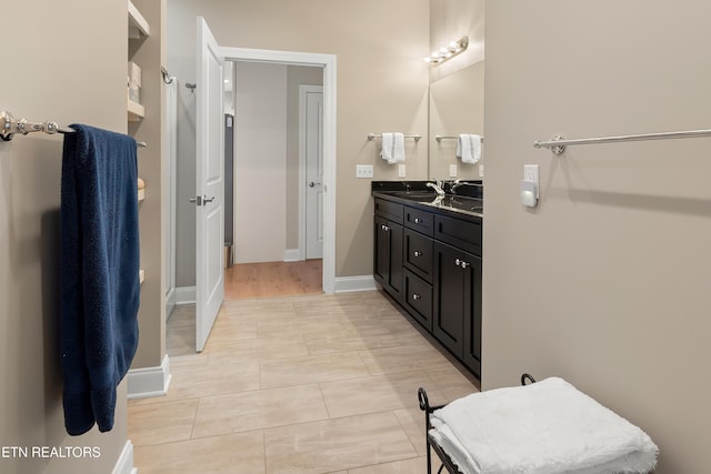 bathroom featuring vanity and tile patterned floors