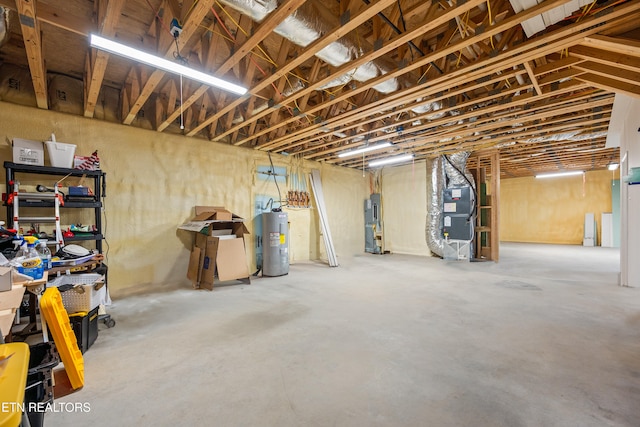 basement featuring water heater and heating unit