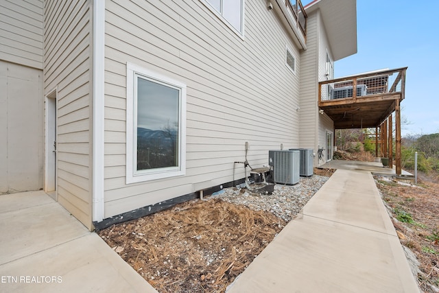 view of home's exterior featuring a patio and central AC unit