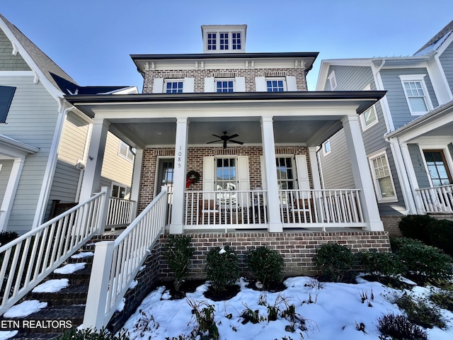 view of front of home with ceiling fan and a porch